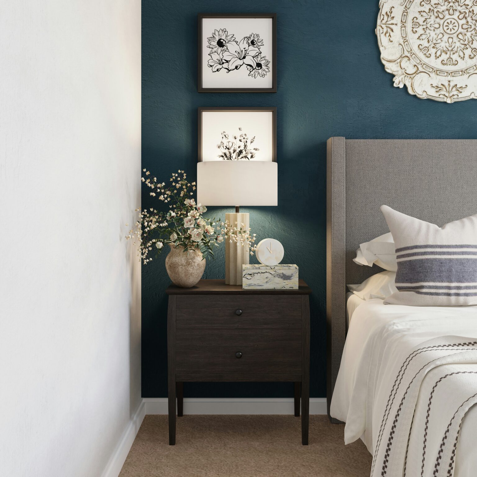 Bedroom with a night stand and a blue accent wall