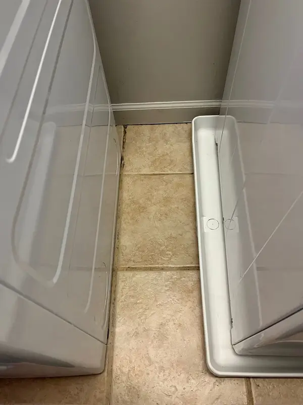 The same tile floor and tray clean after deep cleaning