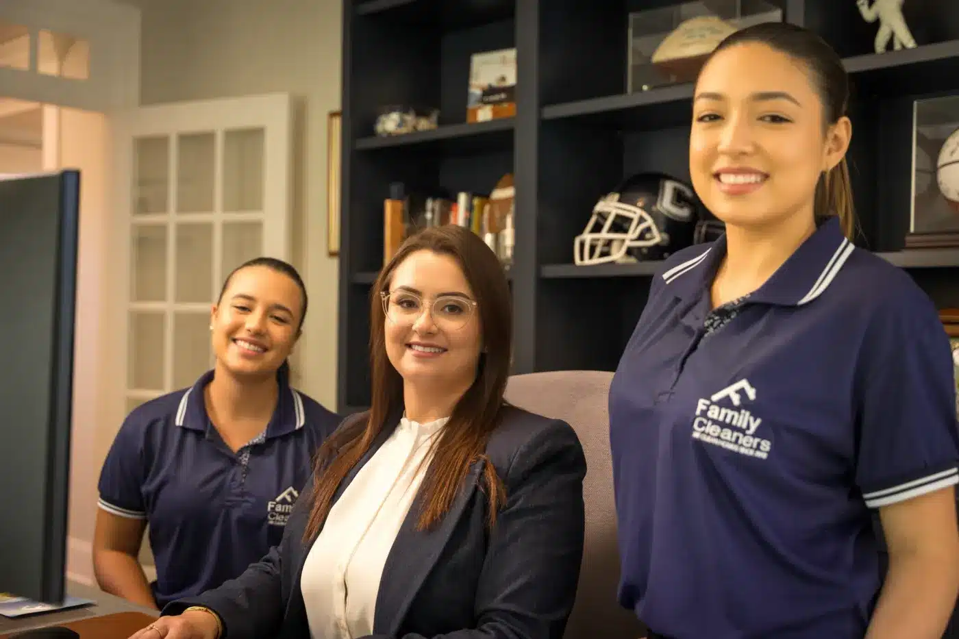Office Cleaning Services 3 CEO Caroline Compiani with two Family Cleaners office team members in navy polos